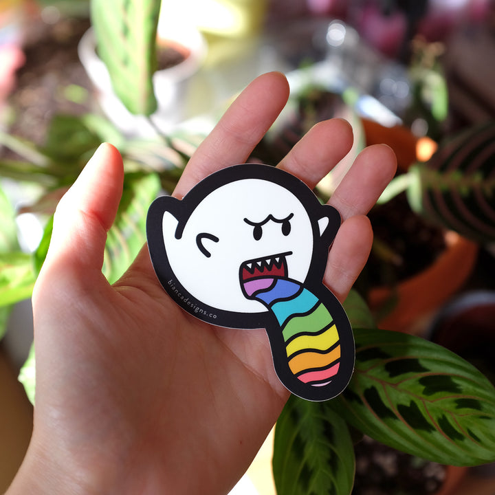 Hand holding the Gay Boo Pride Sticker by Bianca Designs