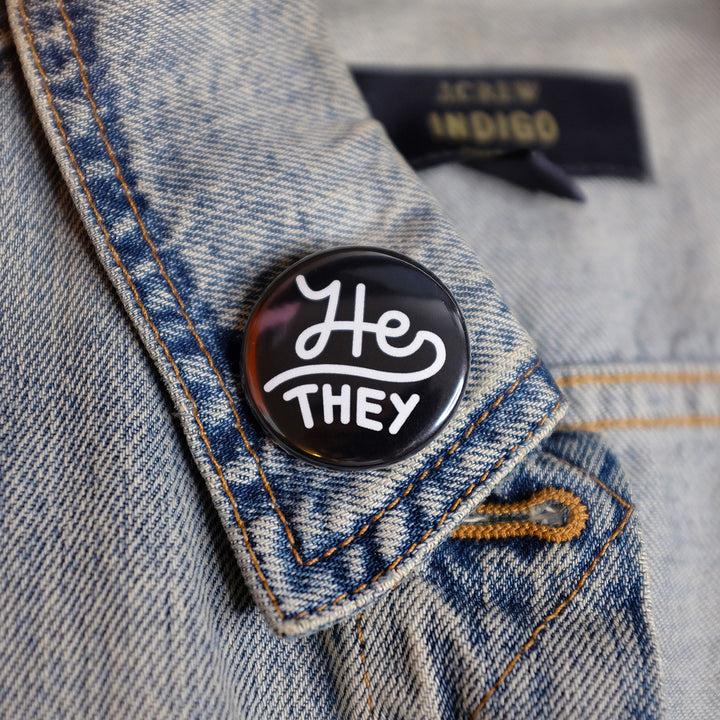 He/they Pronouns Button by Bianca Designs.