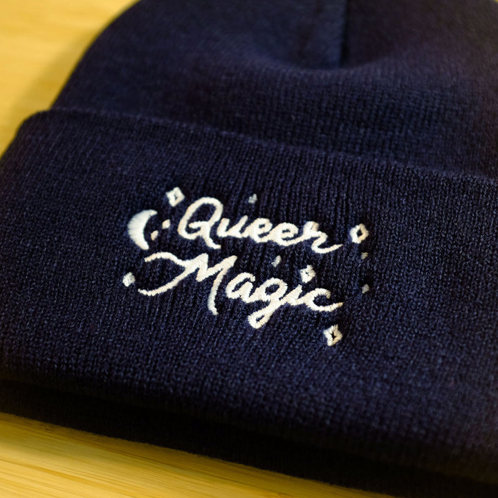 Close-up of the Queer Magic Beanie, in Navy, by Bianca Designs.