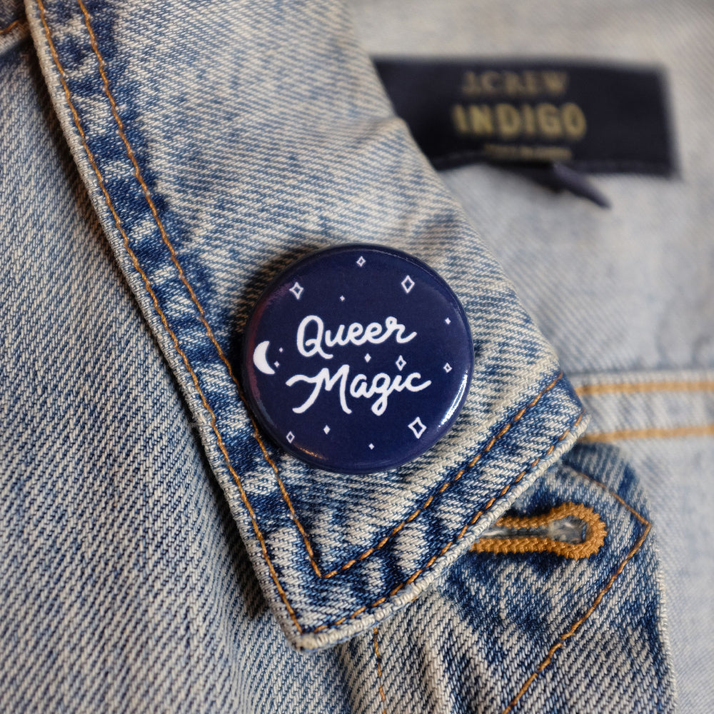 Queer Magic Pinback Button, worn on a denim jacket, by Bianca Designs.