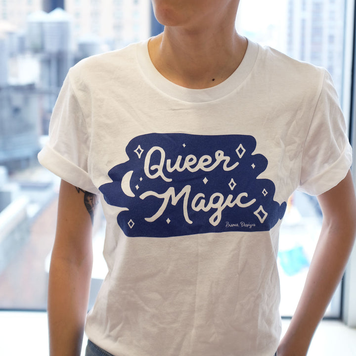 Model wearing the Queer Magic (Full Print) T-shirt in White by Bianca Designs