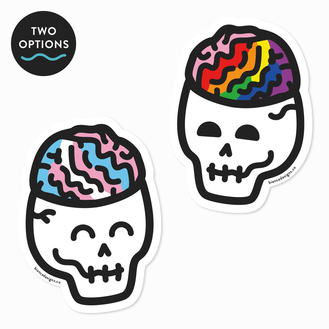 Two options of Queer Brain Skull Stickers. One Skull has the Pride Flag colors on their brain and the other has the Trans Pride colors. Both are very happy Skulls!
