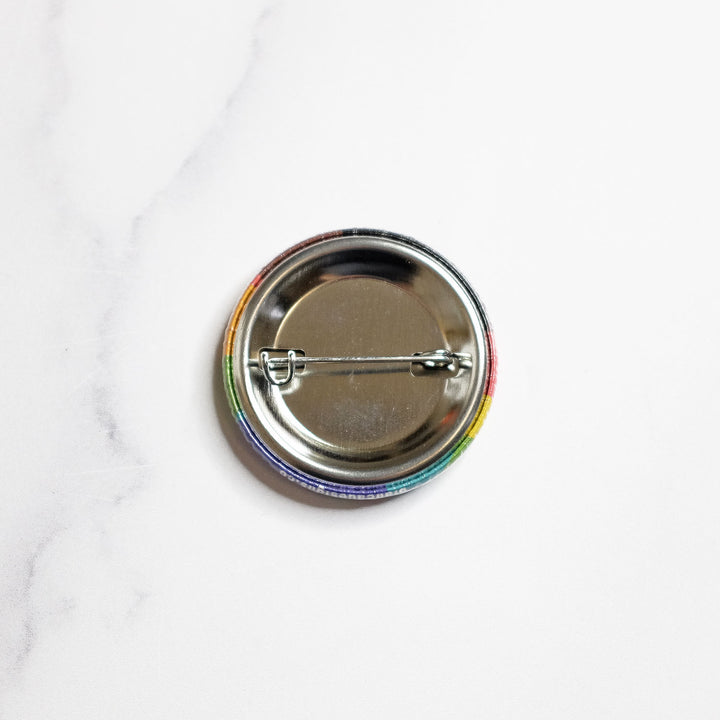 Back view of the Wavy QTPOC Pride Rainbow Button by Bianca Designs.